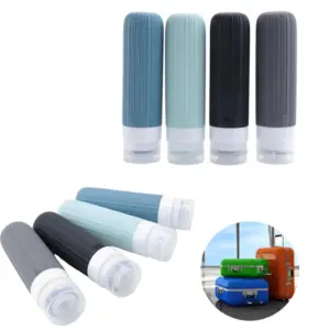 Set X 4 Botellas Siliconadas De Viaje Liso Celeste - 90 Ml